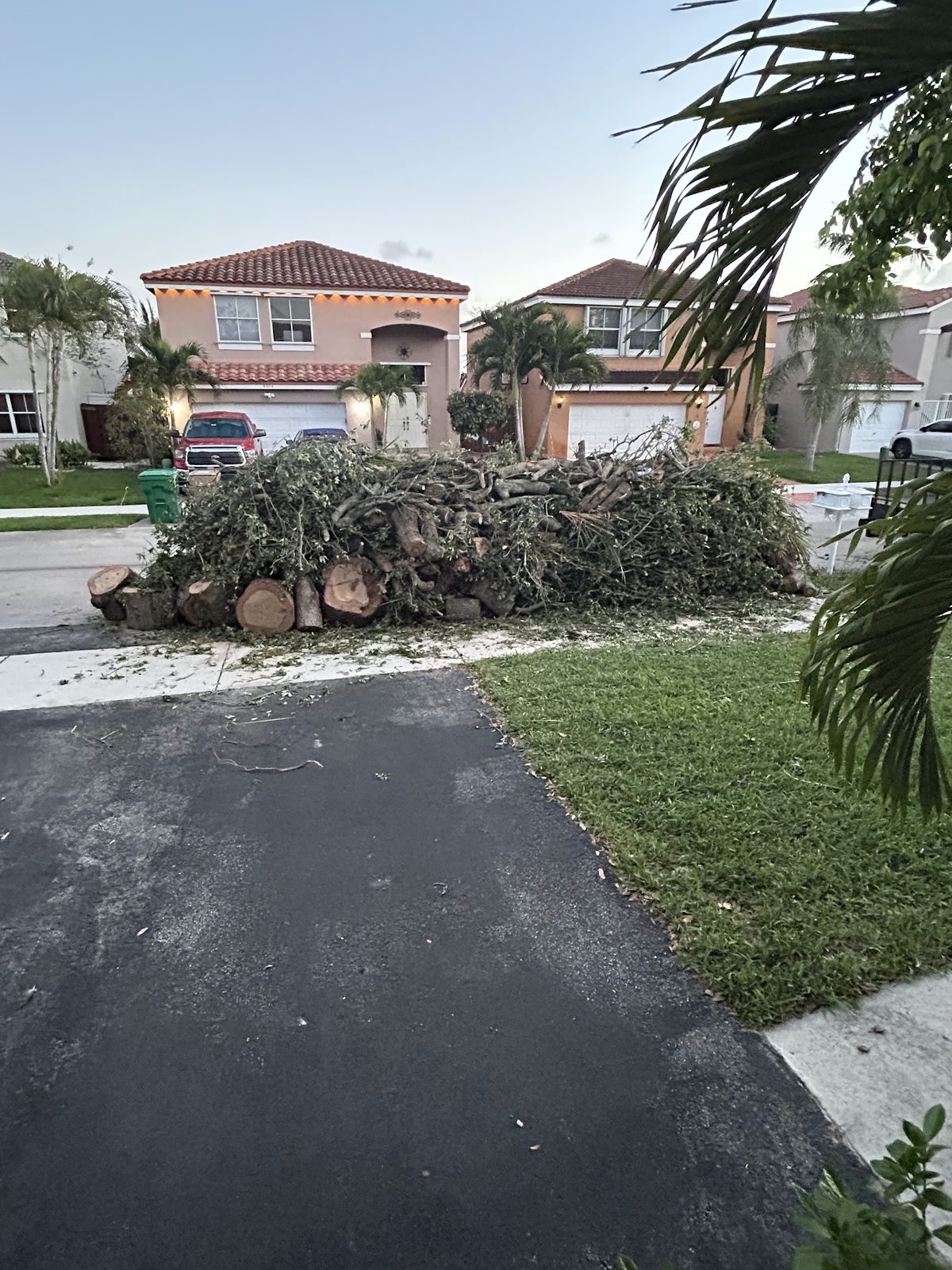 Debris staged curbside for fast haul-away